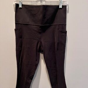 Black Althleta 7/8 Salutation Stash Leggings